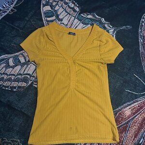 Yellow v-neck tight fitted blouse